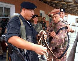 Kyrgyz police officers prepare for emergency